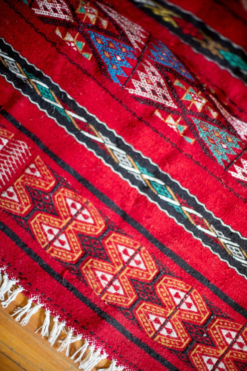 Red kilim with geometric patterns