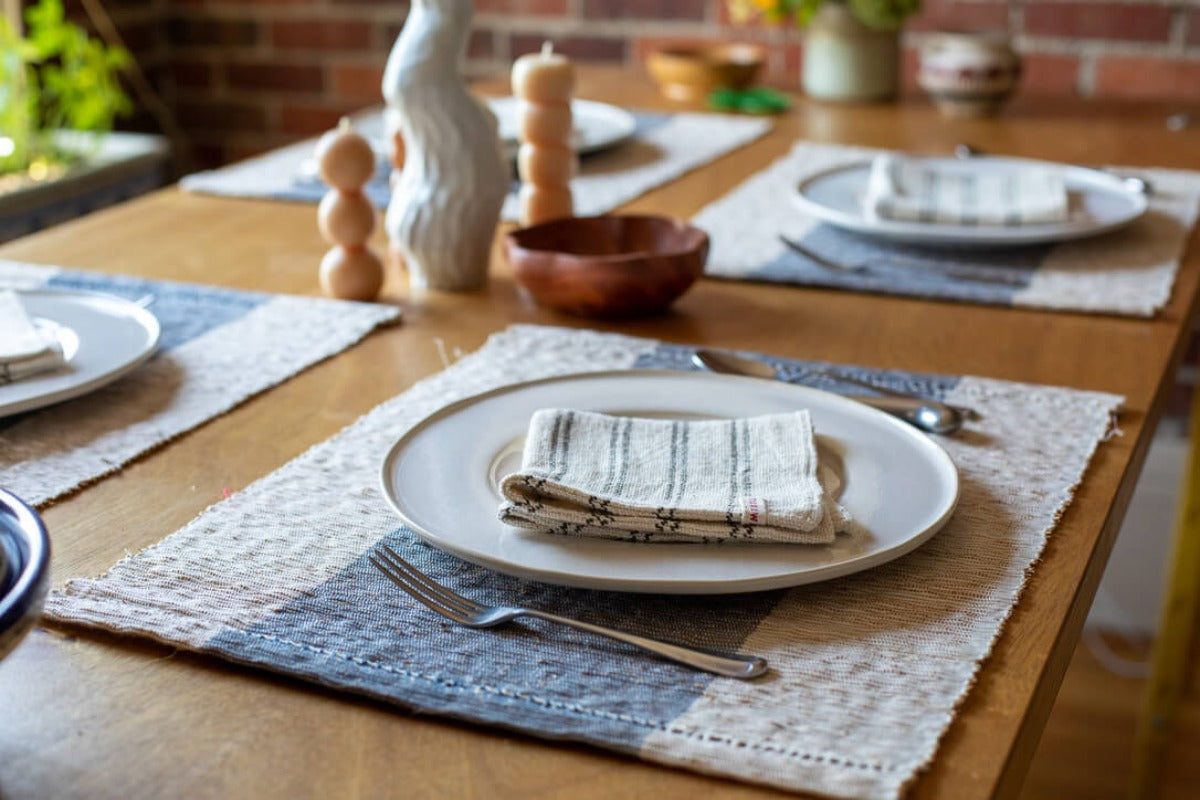 Table set with handmade napkins and placemats.