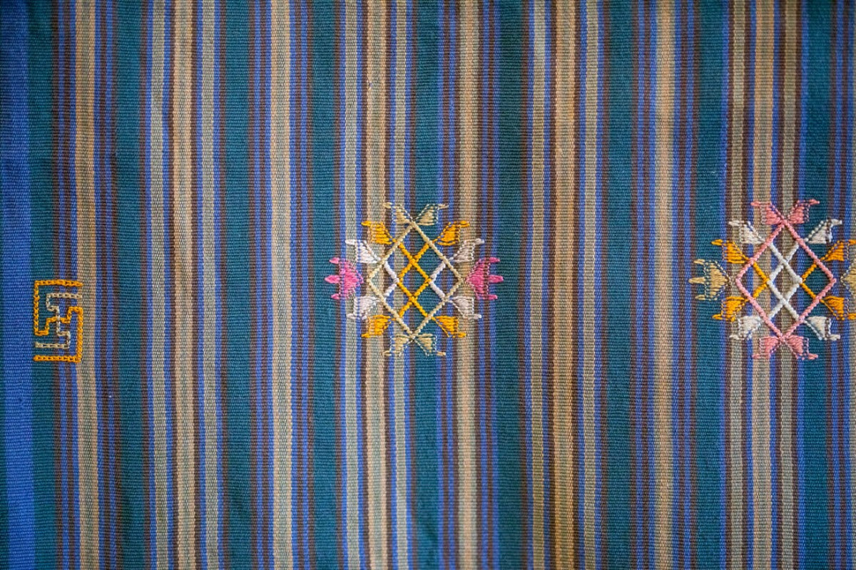 Motifs on striped tablecloth