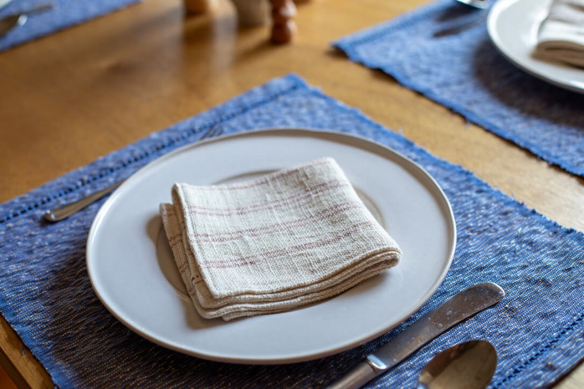 Table setting with cotton napkin and placemat