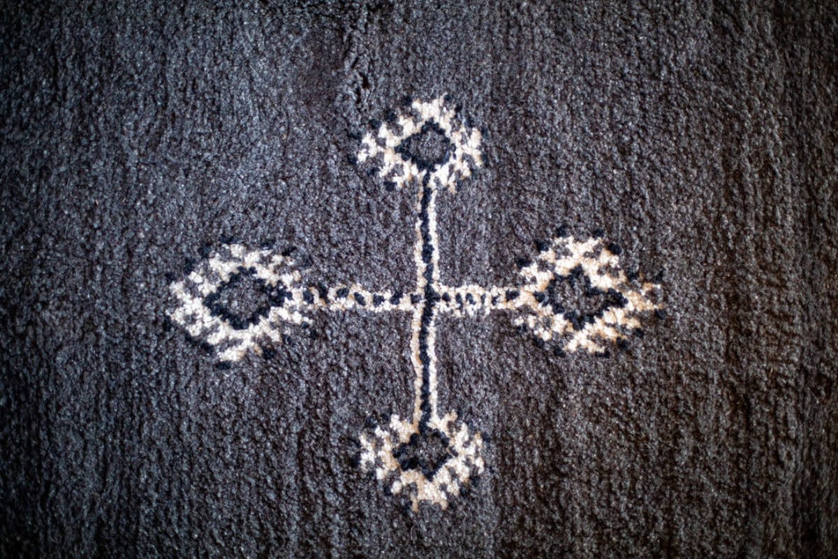 Center motif of gray rug