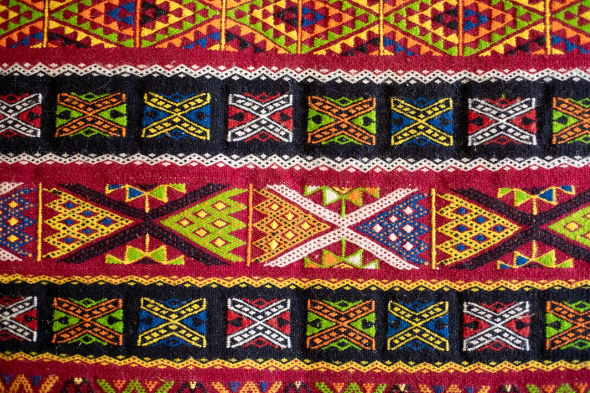 Multicolored patterned kilim rug