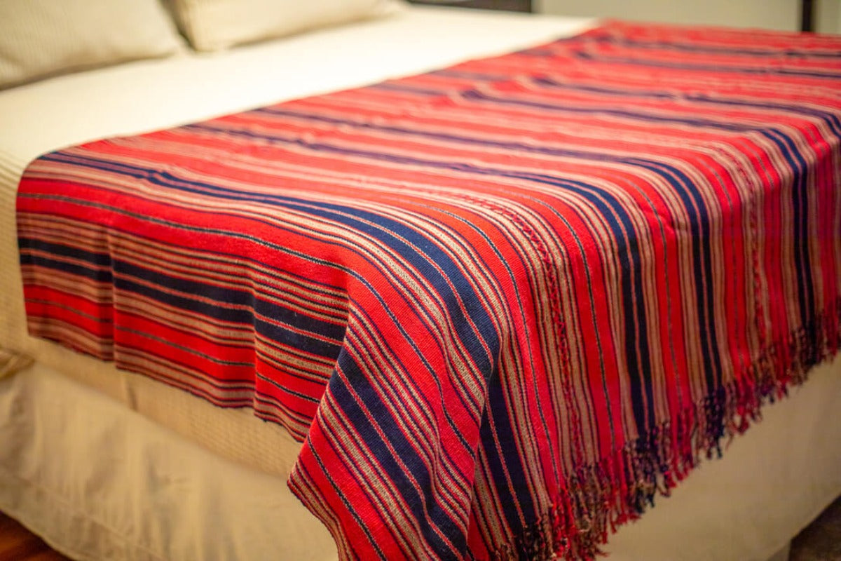 Red and blue striped bedspread