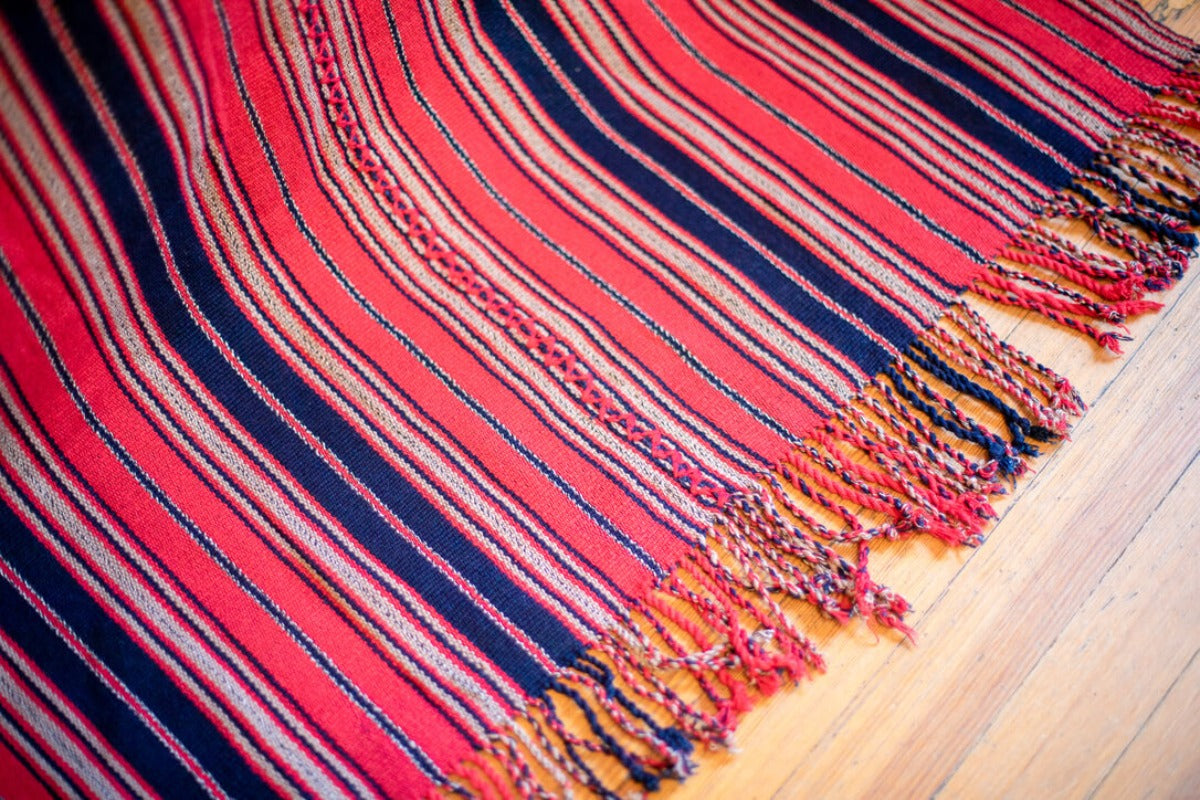 Striped bedspread with tassels