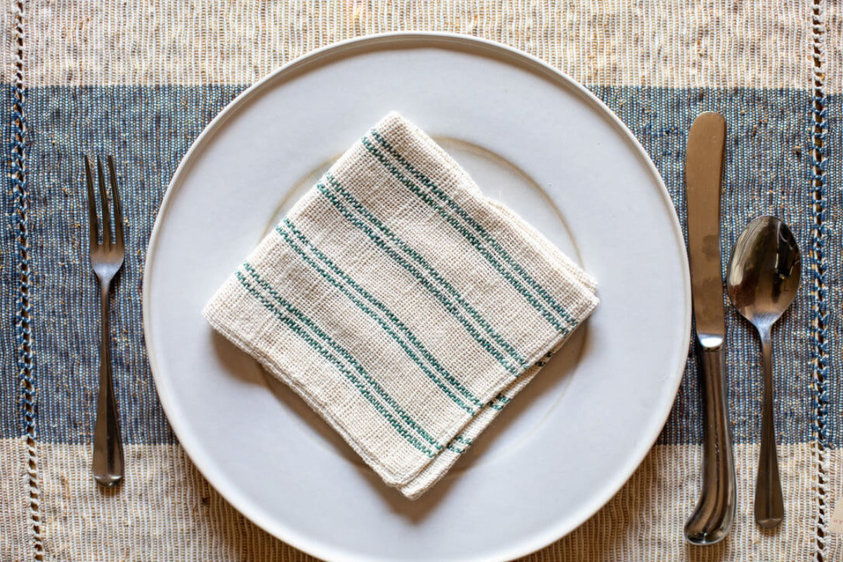 Forest green napkin on a table setting
