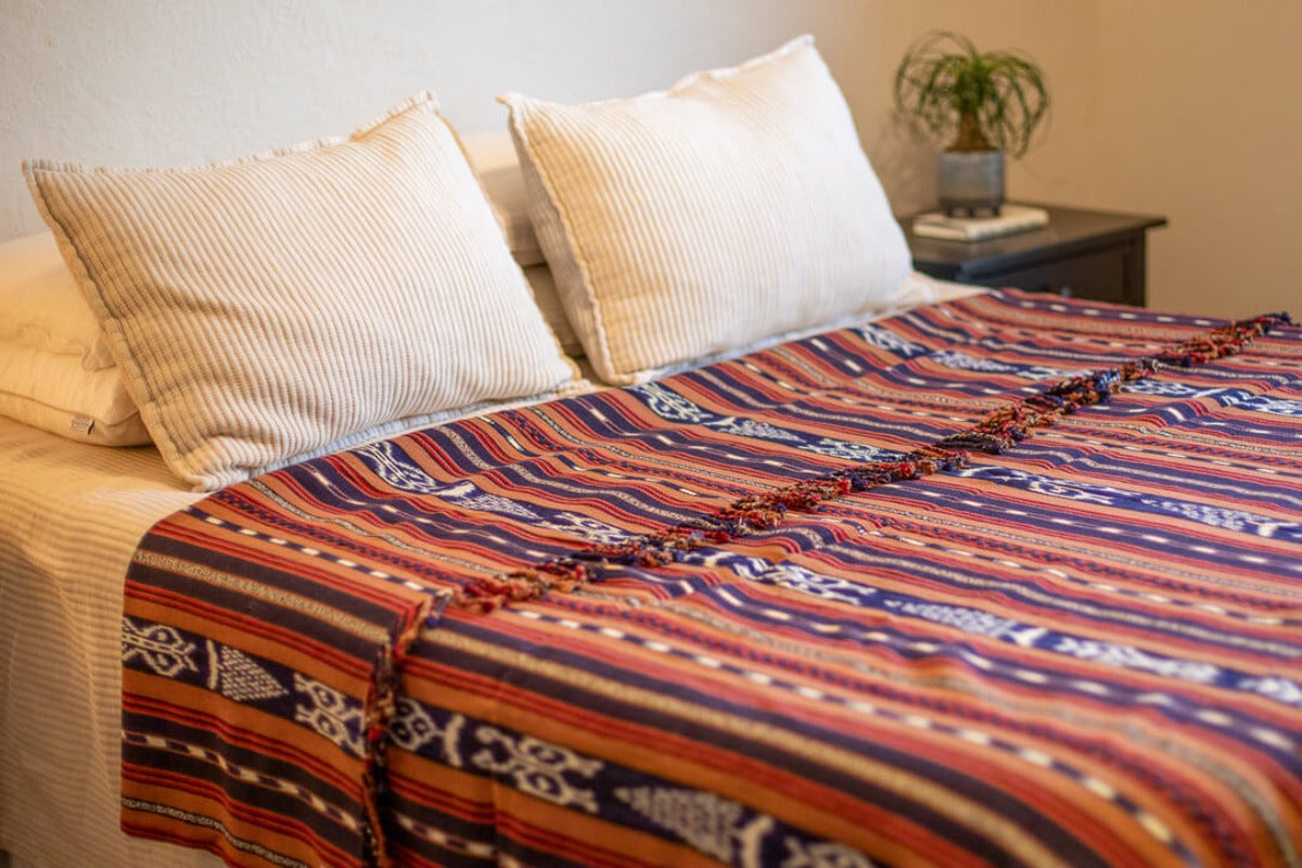 Coffee colored bedspread with indigo