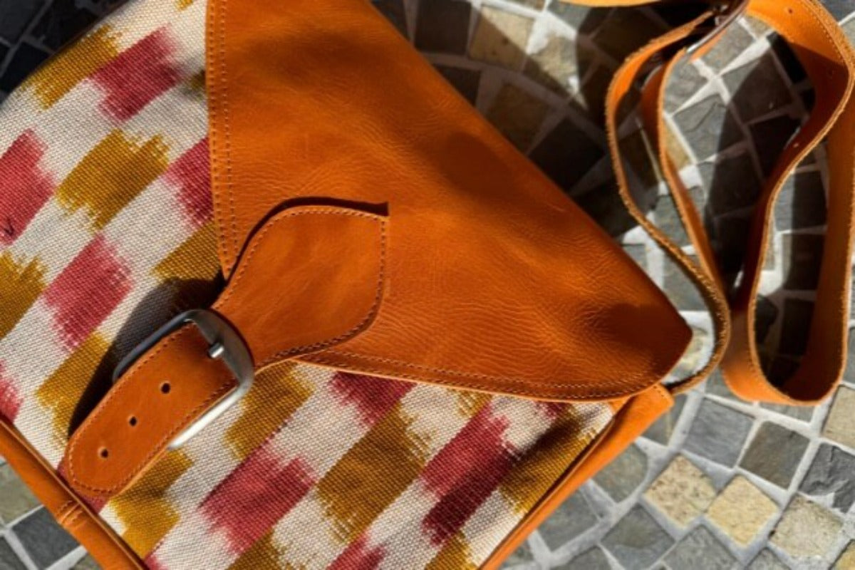 Crossbody bag with checkered rust colored design