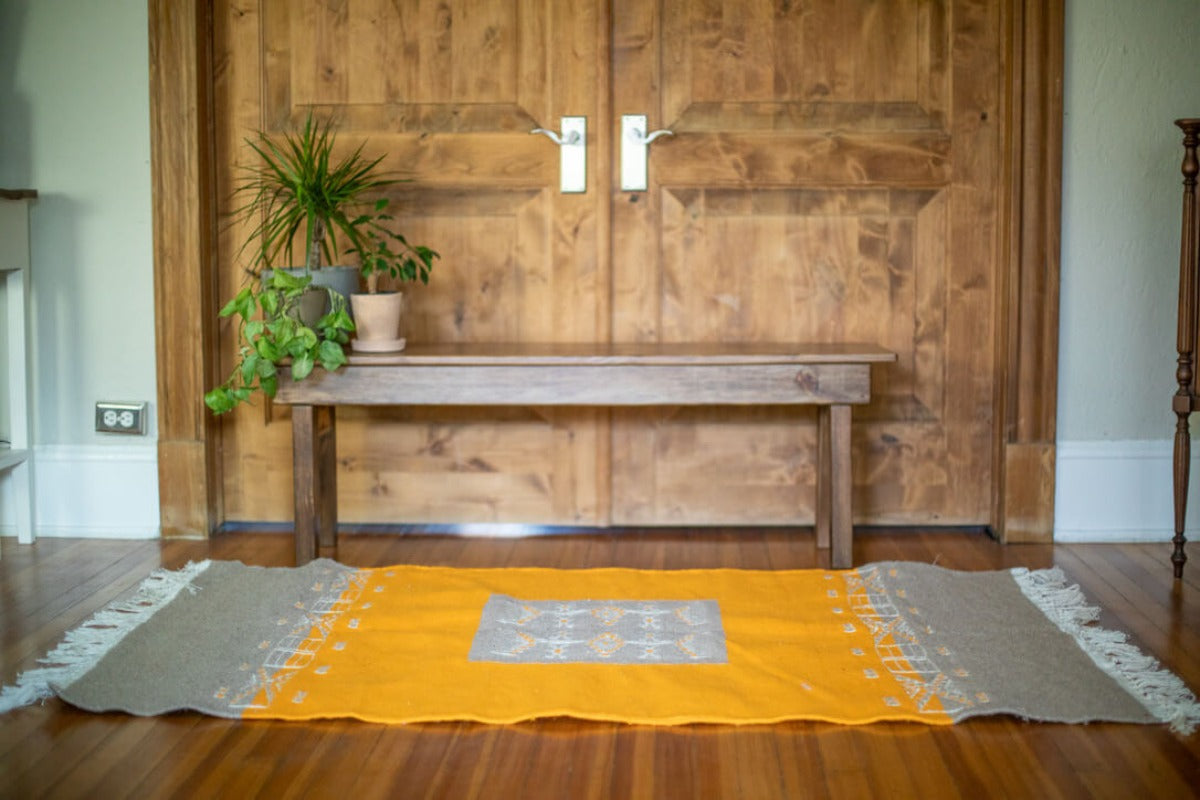 Gray and mustard flatweave rug
