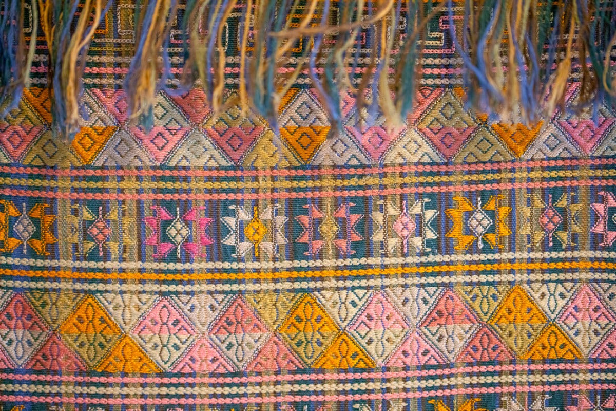 Fringe and pattern on a cotton tablecloth