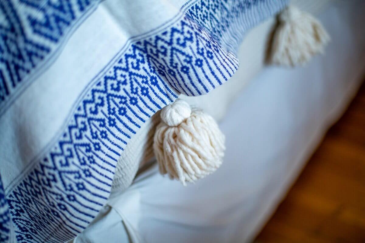 Indigo patterned throw blanket with tassels